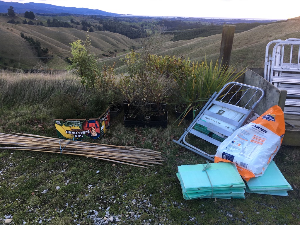 Plants and planting gear staged at the farm, ready to go